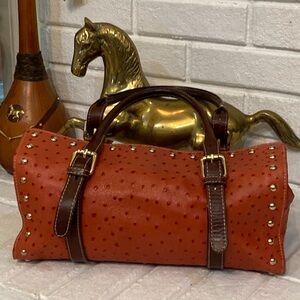 Kate, Landry( Firenze) ostrich print ,salmon color, barrel bag.